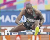  ??  ?? Grant Holloway in the 60 meters hurdles trial at Villa de Madrid Int’l competitio­n, Madrid, Spain, Feb. 24, 2021.