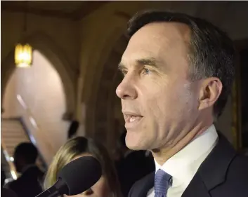  ?? PHOTO AGENCE QMI, MAXIME HUARD ?? Le ministre Bill Morneau a défendu les changement­s apportés à sa réforme hier.