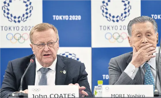  ??  ?? IOC coordinati­on commission head John Coates, left, and Tokyo 2020 president Yoshiro Mori attend a press conference yesterday.