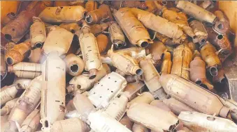  ??  ?? Edmonton police say they have discovered hundreds of catalytic converters in a rental trailer with an estimated recycling value of more than $300,000. A 24-year-old man faces multiple charges.