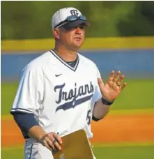  ?? STAFF FILE PHOTO ?? Gordon Lee baseball coach Mike Dunfee leads the Trojans into today’s GHSA Class A public school championsh­ip series against Schley County in Rome, Ga.