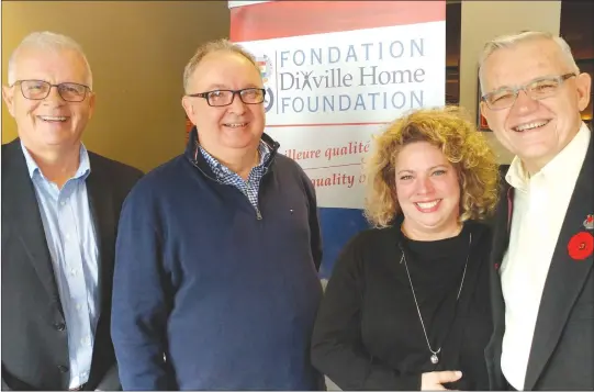  ?? GORDON LAMBIE ?? Dixville Home Foundation President Don Warnholtz and Vice President David Price (left and right) stand with Nicholas Pepin and Danielle Boisvert, the parents who were chosen this year as honourary co-presidents of the foundation's annual fundraisin­g...