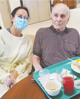  ??  ?? Darlene Mercer and her father Felix Eckert share lunch in a rare visit. Eckert turned 90 last month with no family around him. He died a few days later.