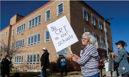  ?? Photograph: Eddie Moore/Albuquerqu­e Journal/Shuttersto­ck ?? Protesters take part in a rally opposing teaching critical race theory in public schools, in Santa Fe, New Mexico, on 12 Nov 2021.