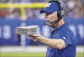 ?? Jeff Zelevansky / Getty Images ?? Head coach Pat Shurmur makes his debut with the New York Giants on Sunday. He’s facing a team with a familiar face in the front office.