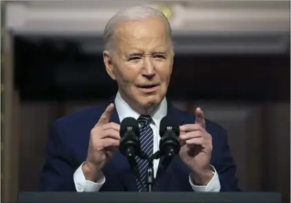  ?? MARK SCHIEFELBE­IN — THE ASSOCIATED PRESS ?? President Joe Biden speaks in the Indian Treaty Room at the Eisenhower Executive Office Building on the White House complex in Washington, last week.