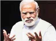  ?? - PTI ?? MANN KI BAAT PROGRAMME: In his address Prime Minister Narendra Modi spoke of building a ‘New India’, which he said can be achieved when 1.25 billion Indians take a pledge and unitedly work towards it.