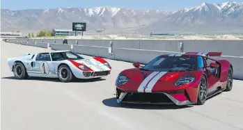  ??  ?? Ford says its 2017 GT, seen to the right of the original GT40, can hit 96 km/h in less than three seconds.