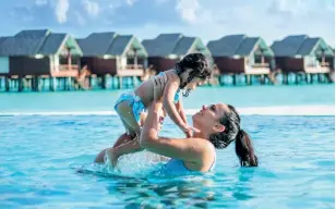  ??  ?? Heritance Aarah provides special activities for children. Below: The resort offers 150 villas and suites.