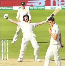  ?? — AFP photo ?? England’s Ben Stokes (left) celebrates hitting the winning runs on the fourth day of the third Ashes cricket Test match between England and Australia at Headingley in Leeds, northern England.