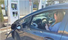  ?? KAYLA DWYER/INDIANAPOL­IS STAR FILE ?? The Indiana Department of Transporta­tion is teaming up with Purdue University and Cummins Inc. to install a stretch of highway to test wirelessly charging electric vehicles as they travel.