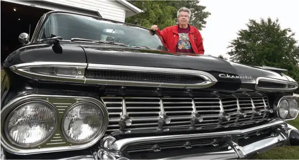  ?? CITIZEN PHOTO BY BRENT BRAATEN ?? George Windsor stands with his 1959 Chevrolet Impalla that has only 66,000 original miles on it. The car was one of only 1,649 of that model built in Canada. Windsor will be showing this car at this Sunday’s annual Father’s Day Show and Shine in...