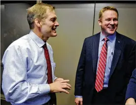  ?? NICK GRAHAM / STAFF 2016 ?? Warren Davidson, R-Troy, is supporting fellow Ohioan, Jim Jordan, R-Urbana, to be the next U.S. House speaker. Here, Jordan (left) is pictured Jan. 21, 2016, at Homewood Suites in West Chester Twp. after he announced his endorsemen­t of Davidson (right)...