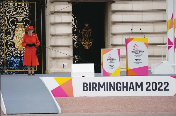  ?? (AP/Matt Dunham) ?? Britain’s Queen Elizabeth II attends the Birmingham 2022 Commonweal­th Games Queen’s Baton Relay event Thursday outside Buckingham Palace in London.