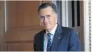  ?? SUSAN WALSH/AP ?? Sen. Mitt Romney, R-Utah, walks out of a Republican policy luncheon on Capitol Hill last month.