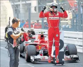  ?? AFP ?? Ferrari's Sebastian Vettel rejoices after winning the Monaco Grand Prix on Sunday.