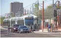  ?? TOM TINGLE/THE REPUBLIC ?? A light rail train stops at Central Avenue and Campbell Avenue looking south in Phoenix on June 22, 2015.