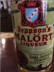  ?? JANET PODOLAK — THE NEWS-HERALD ?? Jeppson’s Malort, a liqueur made from hallucinog­enic wormwood, is chased with a slug of Old Style beer for a concoction called the “Chicago Handshake.”