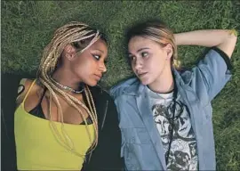  ?? A24 ?? AMANDLA STENBERG, left, and Maria Bakalova give strong performanc­es as a couple in director Halina Reijn’s darkly comic thriller “Bodies Bodies Bodies.”