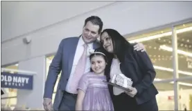  ?? PHOTO ELIZABETH MAYORAL CORPUS ?? FROM LEFT: Board of Supervisor­s Chairman Jesus Eduardo Escobar, his daughter and county Public Health Director Janette Angulo on Thursday during the 2022 State of the County reception in Calexico.