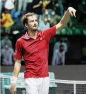  ?? CLIVE BRUNSKILL Getty Images ?? Daniil Medvedev of Russia celebrates his Davis Cup semifinal win over Germany’s Jan-Lennard Struff on Saturday. Next up is Croatia’s Marin Cilic for the title.