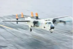  ??  ?? File photo shows a C-2A Greyhound logistics aircraft landing on the flight deck of the aircraft carrier USS Harry S Truman in the Atlantic Ocean. — Reuters photo