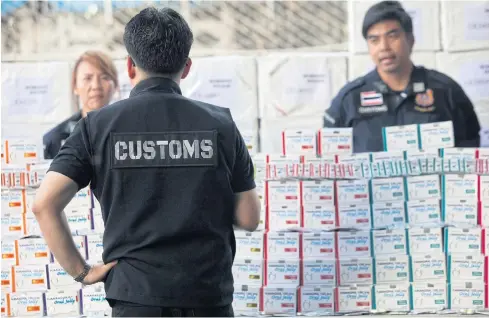  ??  ?? Customs officials seized sildenafil acetate pills and foreign cigarettes after cracking down on smuggled, counterfei­t and unpaid tax products.