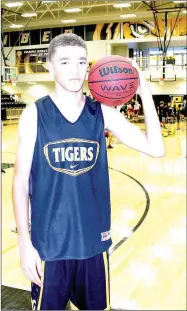  ?? MARK HUMPHREY ENTERPRISE-LEADER ?? Prairie Grove guard D.J. Pearson has developed a strong appreciati­on for the game of basketball. His playmaking skills are a vital asset to the success of the Tigers boys in the upcoming school year.