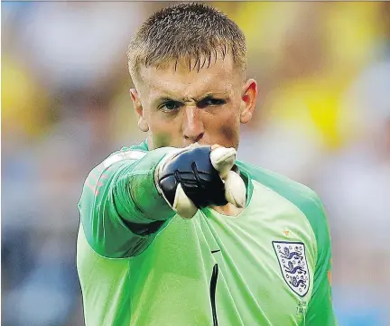  ?? THE ASSOCIATED PRESS ?? England goalkeeper Jordan Pickford produced highlight reel saves in back-to-back wins over Colombia and Sweden, and he’ll have to maintain his brilliant play under enormous pressure if the Three Lions are to beat Croatia on Wednesday to advance to the World Cup final.