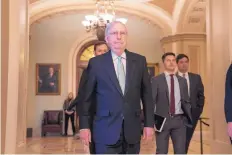  ?? J. SCOTT APPLEWHITE/ASSOCIATED PRESS ?? Senate Majority Leader Mitch McConnell, R-Ky., leaves the chamber after criticizin­g House Democrats' effort to impeach President Donald Trump in Washington on Tuesday.