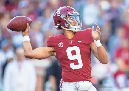  ?? VASHA HUNT/AP ?? Alabama quarterbac­k Bryce Young passes against Arkansas last Saturday in Tuscaloosa, Ala. Young threw for 559 yards in the game to set an Alabama record.