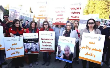  ??  ?? File photo shows Moroccans gathering in front of Denmark’s embassy in Rabat to honour Ueland and Vesterager Jespersen, who were killed in Morocco, in Rabat, Morocco. — Reuters photo