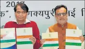  ?? PTI ?? Commerce and industry minister Suresh Prabhu (left) and finance secretary Hasmukh Adhia at the release of the midterm review of the foreign trade policy, in New Delhi on Tuesday
