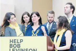  ?? MIKE STOCKER/SUN SENTINEL ?? Bob Levinson’s children Samantha Levinson, from left, Stephanie Curry, Susan Boothe, Sarah Moriarty, Dan Levinson and Douglas Levinson speak during a 2017 “Help Bob Levinson” rally at the Center for the Arts in Coral Springs.