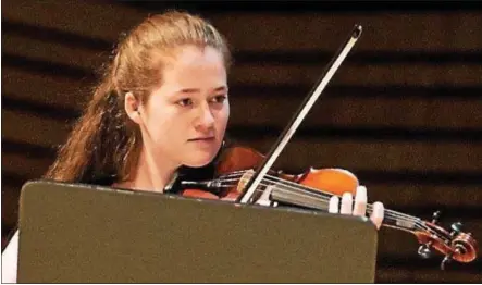  ?? PHOTO PROVIDED ?? Ava Doyle, a student at Emma Willard School in Troy who is also a violinist with the Empire State Youth Orchestra, worked with leaders of the orchestra to secure a $25,000grant to help music programs in Schenectad­y schools and at the Hope 7Community...