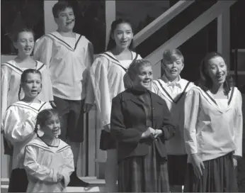  ??  ?? The musical's main character Maria, played by Eliza Switzer, performs the song Do-Re-Mi with the Von Trapp children during a rehearsal, Nov. 25.