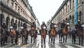  ?? MAXIME REYNIE ?? Police are ready to quell gilets jaunes (aka “yellow vests”) protestors in Paris in the documentar­y “The Monopoly of Violence.”