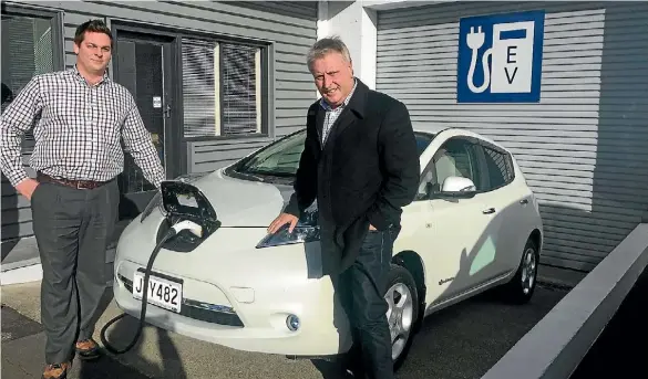  ??  ?? Central Motor Group’s used car manager, Steven Greenwood and Mayor David Trewavas, officially opened Taupo CBD’s first Electric Vehicle charging station.