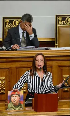  ??  ?? Urgent call: Venezuelan government’s deputy Tania Diaz delivering a speech during an extraordin­ary session of the National Assembly in Caracas. — AFP