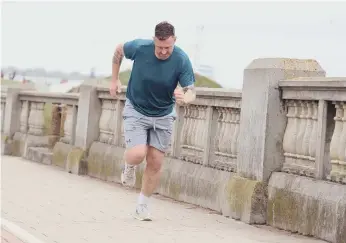  ??  ?? Johnny runs from his home in Hartlepool to his work place in Sunderland as part of his training.