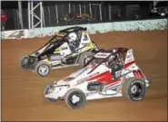  ?? CARL HESS - FOR DIGITAL FIRST MEDIA ?? Jay Hartman (#026) and “Mr. Excitement” Kenny Brightbill (#19) battle for the lead in the 30 lap SpeedSTR main event. In the end it would be Hartman taking the win with Brightbill edging Tim Buckwalter for the runner-up spot.
