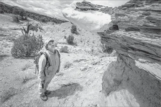  ?? Photograph­s by Brian van der Brug Los Angeles Times ?? PALEONTOLO­GIST Alan Titus hopes to unearth a new species of dinosaur this season on the Kaiparowit­s Plateau in the Grand Staircase-Escalante monument.