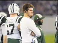  ?? Mark Zaleski / Associated Press ?? Jets quarterbac­k Sam Darnold watches from the sideline during Sunday’s game against the Titans.