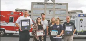  ?? Terrance Armstard/News-Times ?? Happy Hearts: The American Heart Associatio­n presented top awards to Medical Center of South Arkansas, ProMed Ambulance and the El Dorado Fire Department. Standing from left are El Dorado Fire Chief Chad Mosby, Kristen Walker, Medical Center of South...