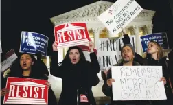  ?? (Reuters) ?? PROTESTERS RALLY outside the US Supreme Court against President Donald Trump’s nominee for the bench, in Washington on Tuesday.