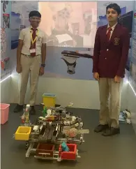  ??  ?? Aaron Shabu and Arjun Bhorkar with their robot called ‘Terra Nova’ that can collect, sort and transport biomedical waste.