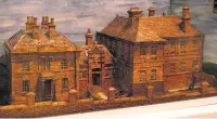  ??  ?? ●●The model of Rochdale Infirmary made from thousands of pieces of cork