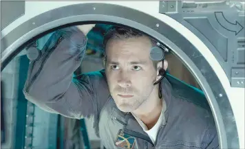  ??  ?? Reynolds plays a wise-cracking engineer/space cowboy in ‘Life’. — Photo courtesy of Sony Pictures Entertainm­ent