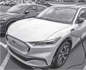  ?? KEITH SRAKOCIC/AP FILE ?? Ford CEO Jim Farley said the company’s Mustang Mach-e electric SUV costs about $25,000 more to produce than a comparable Ford Edge gas SUV.