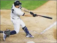  ?? The Associated Press ?? FOLLOWING THROUGH: New York Yankees’ Gary Sanchez follows through on a single during the sixth inning of Tuesday’s game against the Baltimore Orioles in New York. The Yankees won 8-3.